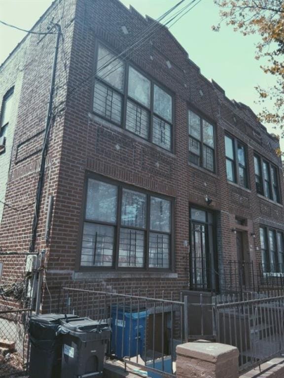 360 E 98th St, Brooklyn, NY 11212 - view of building exterior featuring fence
