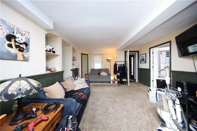 115 Wilson Ter, Staten Island, NY 10304 - living room featuring carpet and a wainscoted wall