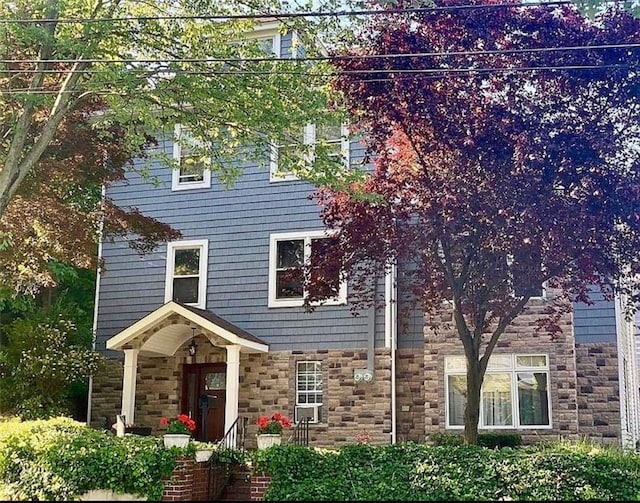 view of front of house featuring stone siding