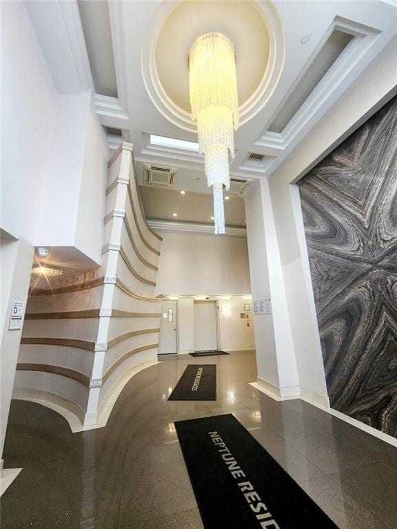 common area with stairway and visible vents