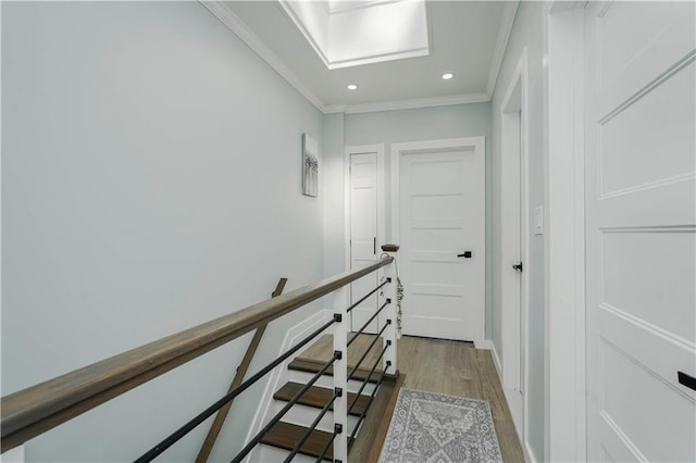 286 Bay 10th St, Brooklyn, NY 11228 - hallway featuring wood finished floors, crown molding, recessed lighting, and an upstairs landing