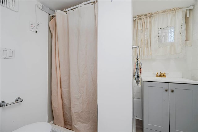 286 Bay 10th St, Brooklyn, NY 11228 - full bathroom with toilet and curtained shower