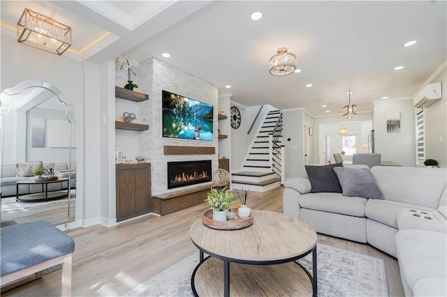 286 Bay 10th St, Brooklyn, NY 11228 - living area with crown molding, an AC wall unit, recessed lighting, a fireplace, and light wood finished floors