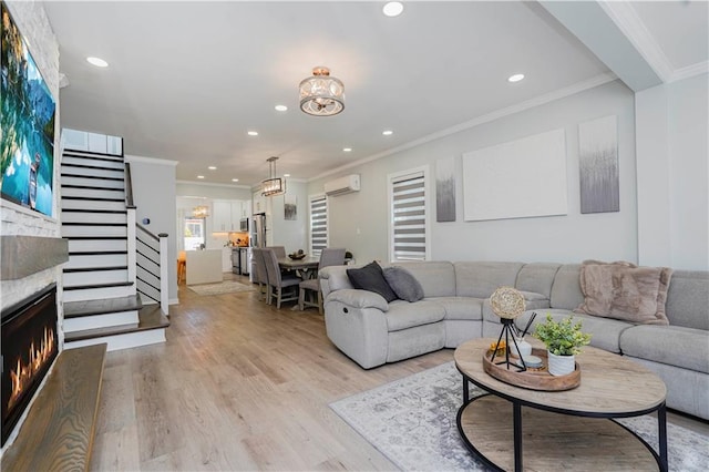 286 Bay 10th St, Brooklyn, NY 11228 - living area featuring a wall unit AC, recessed lighting, stairs, light wood-style floors, and a chandelier