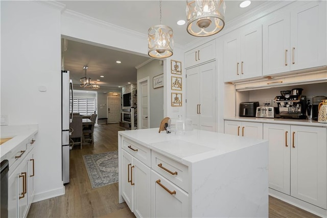 286 Bay 10th St, Brooklyn, NY 11228 - kitchen featuring a chandelier, ornamental molding, freestanding refrigerator, white cabinetry, and wood finished floors