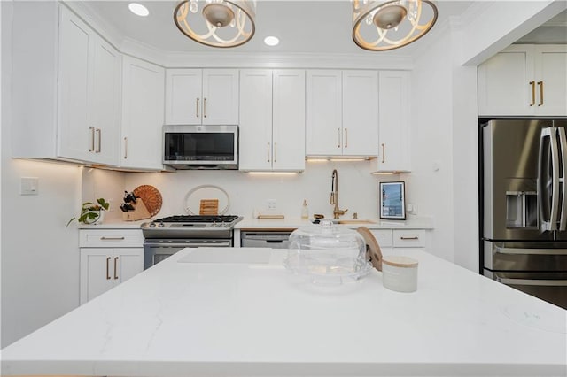 286 Bay 10th St, Brooklyn, NY 11228 - kitchen featuring appliances with stainless steel finishes, white cabinetry, a kitchen island, a chandelier, and recessed lighting