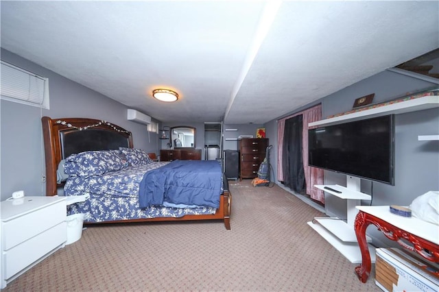 bedroom featuring carpet floors and a wall mounted air conditioner