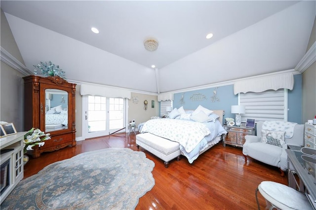 bedroom featuring vaulted ceiling and wood finished floors