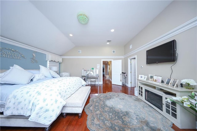 bedroom featuring recessed lighting, wood finished floors, and lofted ceiling