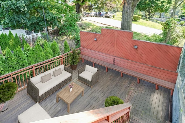 wooden deck featuring outdoor lounge area