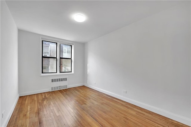 345 Webster Ave Unit 3N, Brooklyn, NY 11230 - unfurnished room with radiator and light wood-style floors