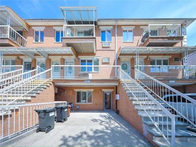 view of building exterior with stairs