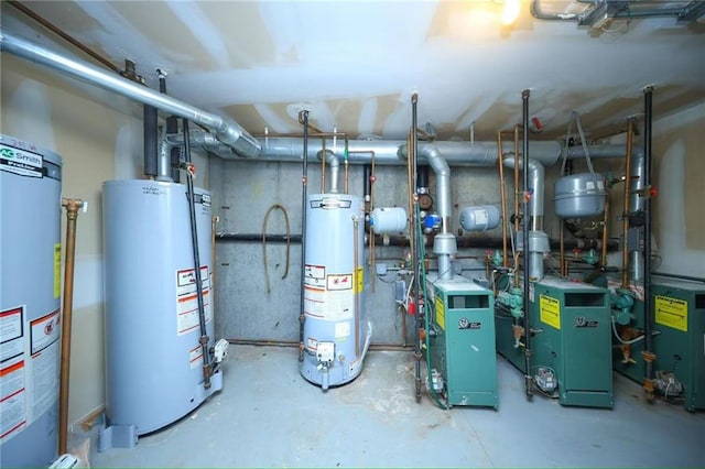 utility room featuring a heating unit, water heater, and gas water heater