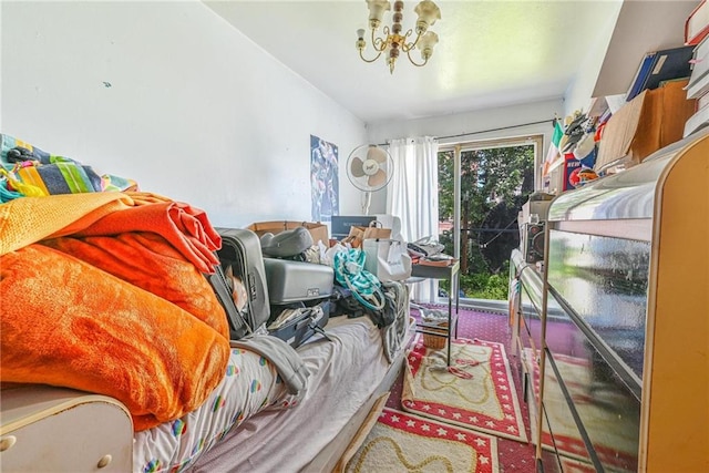 bedroom featuring a chandelier