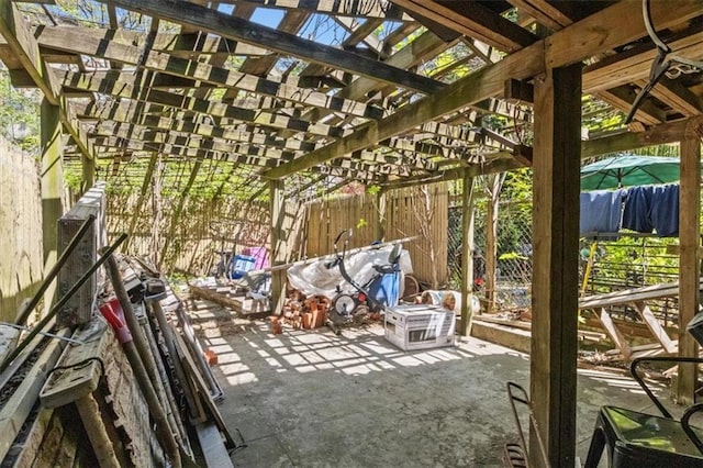 view of patio with fence