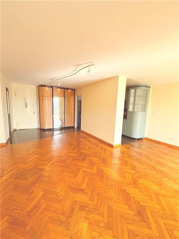 unfurnished room featuring baseboards
