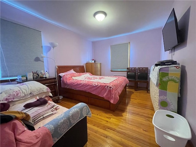 bedroom with light wood-type flooring