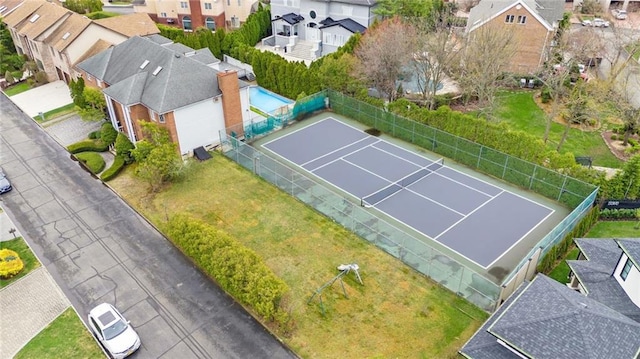 birds eye view of property with a residential view