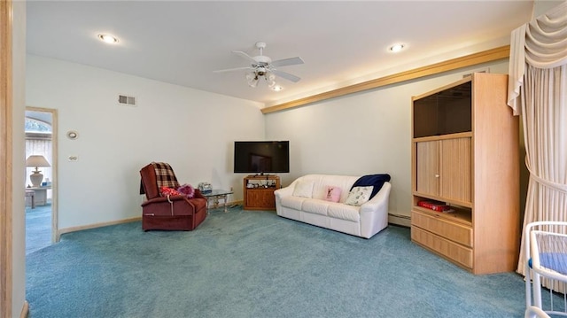 carpeted living area featuring visible vents, baseboards, ceiling fan, and baseboard heating