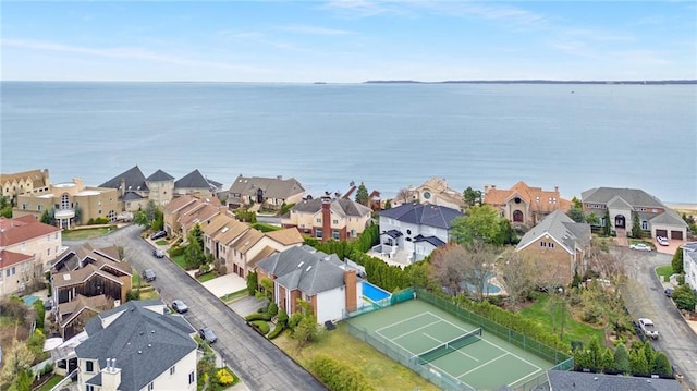 aerial view with a residential view and a water view