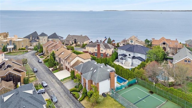 aerial view with a residential view and a water view