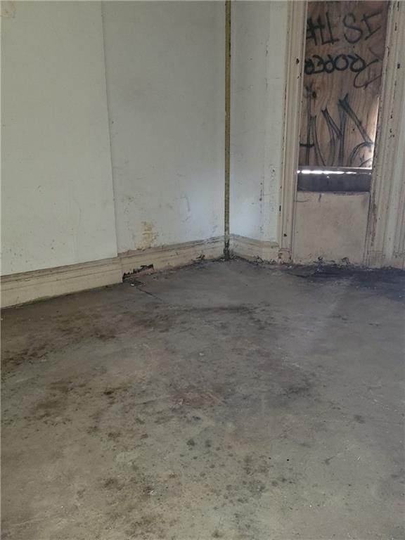interior space with unfinished concrete floors