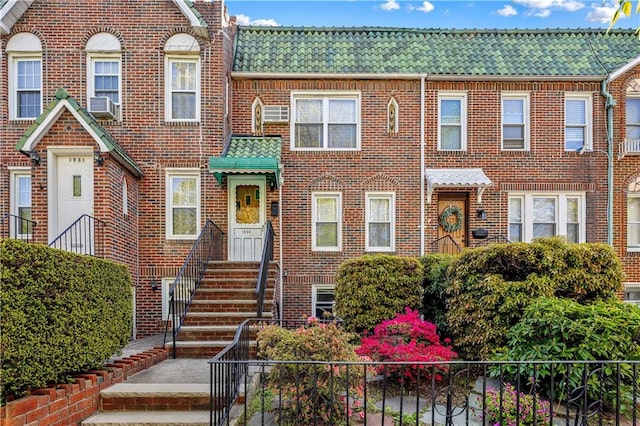 1933 E 28th St, Brooklyn, NY 11229 - view of property featuring brick siding and fence