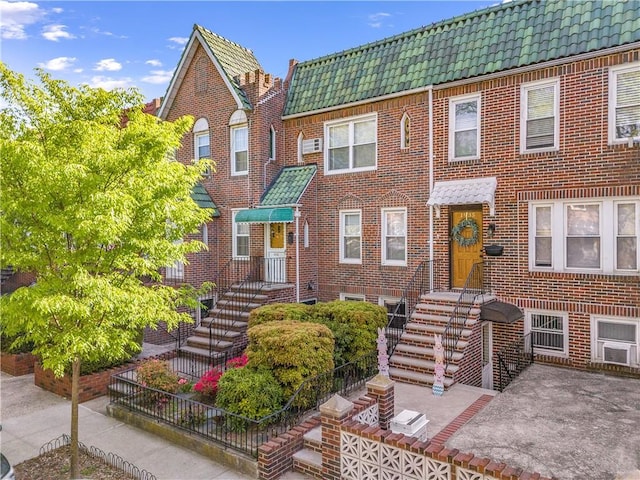 1933 E 28th St, Brooklyn, NY 11229 - view of front of home featuring brick siding and a tiled roof