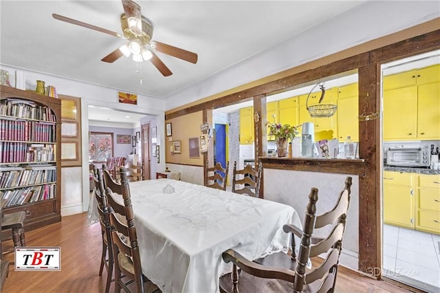 2052 E 28th St, Brooklyn, NY 11229 - dining space with a ceiling fan and wood finished floors