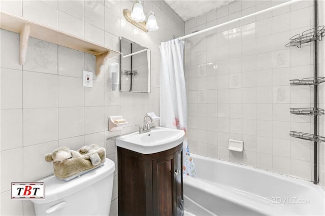 2052 E 28th St, Brooklyn, NY 11229 - full bathroom featuring tile walls, vanity, shower / bath combo, and toilet