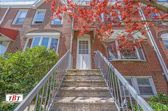 2052 E 28th St, Brooklyn, NY 11229 - property entrance featuring brick siding