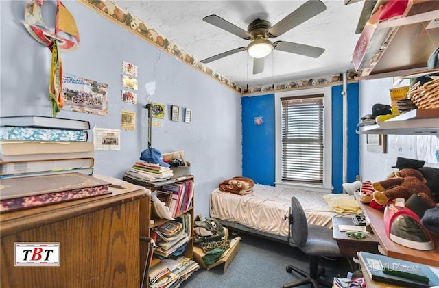 2052 E 28th St, Brooklyn, NY 11229 - carpeted bedroom with a ceiling fan