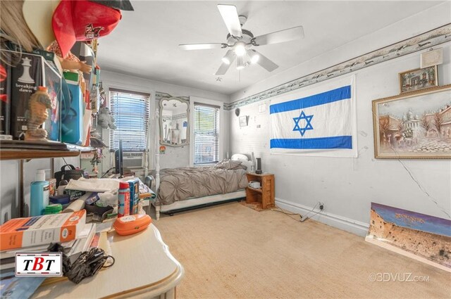 2052 E 28th St, Brooklyn, NY 11229 - bedroom with carpet, baseboards, a ceiling fan, and cooling unit