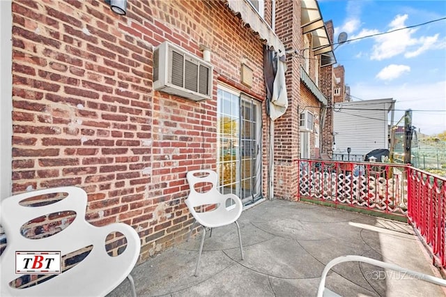 2052 E 28th St, Brooklyn, NY 11229 - view of patio / terrace with a wall mounted air conditioner