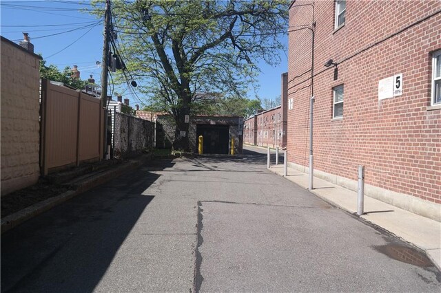 view of asphalt alley