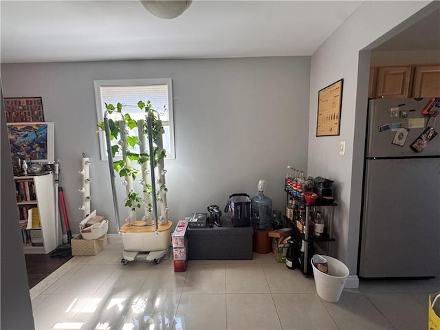 dining space featuring tile patterned floors