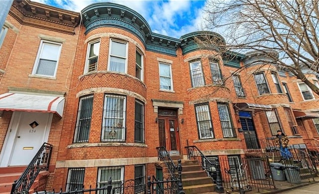 650 51st St Unit 1, Brooklyn, NY 11220 - view of front of home featuring a fenced front yard and brick siding
