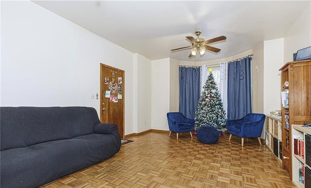 650 51st St Unit 1, Brooklyn, NY 11220 - living area featuring baseboards and ceiling fan