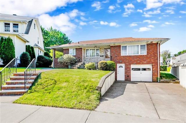 view of front of home with concrete driveway, brick siding, a garage, and a front lawn