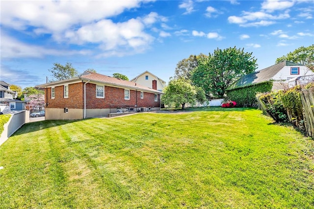 view of yard with fence