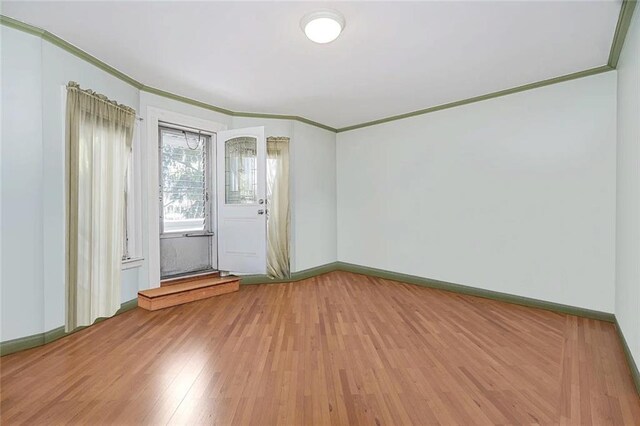 222 Albemarle Rd, Brooklyn, NY 11218 - spare room with ornamental molding, wood finished floors, and baseboards