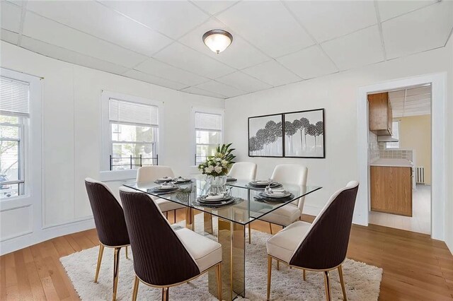 222 Albemarle Rd, Brooklyn, NY 11218 - dining space with a drop ceiling, wood finished floors, and radiator