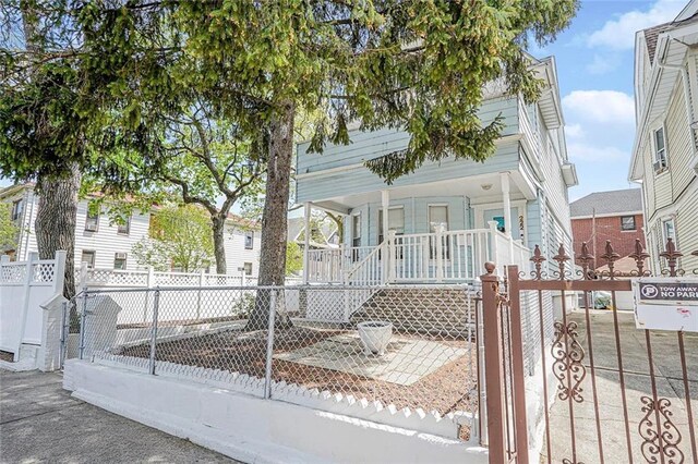 222 Albemarle Rd, Brooklyn, NY 11218 - view of front of house featuring a porch, a fenced front yard, and a gate