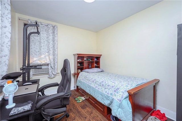 94 Wyona St, Brooklyn, NY 11207 - bedroom featuring wood finished floors, an office area, and cooling unit