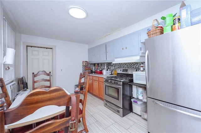 94 Wyona St, Brooklyn, NY 11207 - kitchen featuring appliances with stainless steel finishes, premium range hood, and decorative backsplash