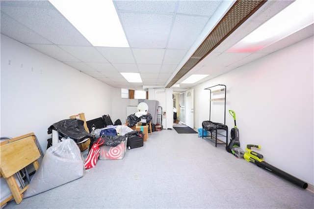 436 76th St, Brooklyn, NY 11209 - basement with a paneled ceiling and tile patterned floors