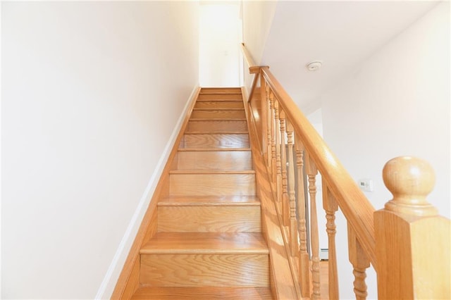 69 Bay 20th St Unit 3A, Brooklyn, NY 11214 - stairs featuring a baseboard heating unit