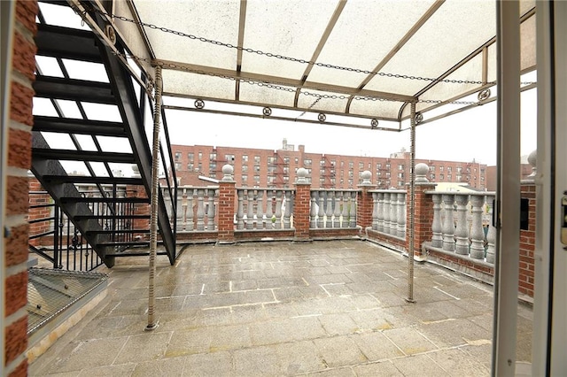 69 Bay 20th St Unit 3A, Brooklyn, NY 11214 - view of patio / terrace with stairs, a city view, and a balcony