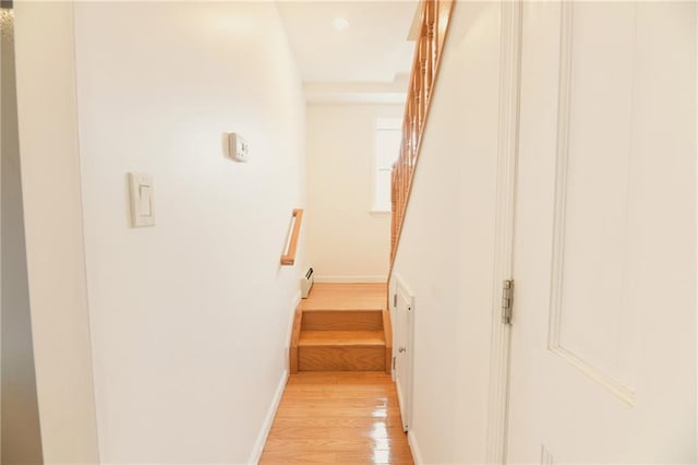 69 Bay 20th St Unit 3A, Brooklyn, NY 11214 - staircase featuring wood finished floors, baseboards, recessed lighting, and a baseboard radiator