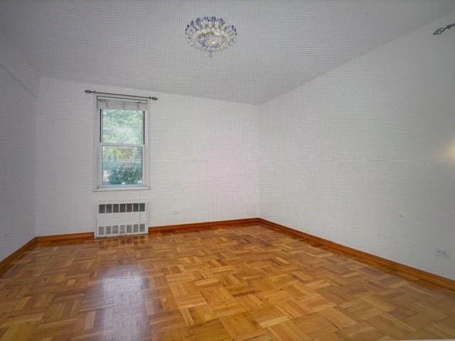2727 Ocean Pkwy Unit A14, Brooklyn, NY 11235 - empty room featuring radiator and baseboards